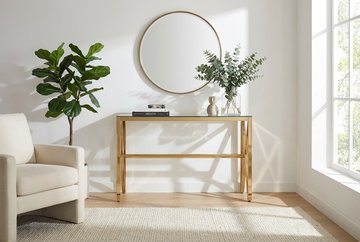 Console métal doré lignes cintrées plateau verre transparent 120cm MAJESTIQUE